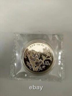 1995 China 1 oz Silver Panda Coin, (Small Twig Small Date, Micro Date)