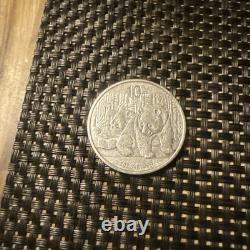 2010 Chine 10 Yuan Argent Panda 1 OZ. 999 argent