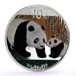 Chine 10 yuans pièce en argent colorée, représentant une famille de pandas géants dans une forêt de bambous, 2011