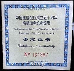 Chine 2004 10 Yuan 1 once pièce Panda en argent 50e anniversaire de la Banque de la Construction NGC MS 69 + COA
