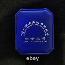 Exposition de pièces de monnaie de Chine Beijing 1999, pièce d'argent Panda 10 Yuan 1 oz Ag. 999