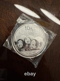 Monnaie en argent de 10 yuans en capsule - Panda 2013 1 oz Ag. 999