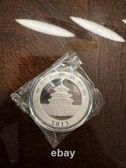Monnaie en argent de 10 yuans en capsule - Panda 2013 1 oz Ag. 999