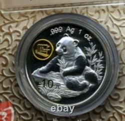 Monnaie en argent doré représentant un panda - Exposition aérospatiale de Chine 1998