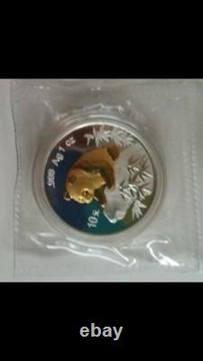 Monnaie en argent plaquée or de l'Expo de Pékin 1999 avec un panda chinois et certificat d'authenticité