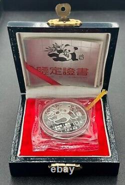 Panda chinois 1989 en argent épreuve 10 Yuan 1oz. 999 ronde en argent fin avec boîte et certificat d'authenticité (OGP)