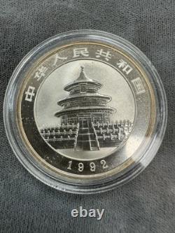 Panda en argent 999 de 1 oz 1992 Chine. Capsule fissurée et patinée de 10 Yuan vintage.