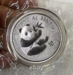 Pièce d'argent du panda de Chine pour l'Exposition internationale de timbres et de pièces de Guangzhou en 2000.