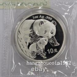 Pièce en argent Panda de 1 once, 10 yuans de Chine de 2004 pour l'Exposition internationale de timbres et de pièces de Beijing.
